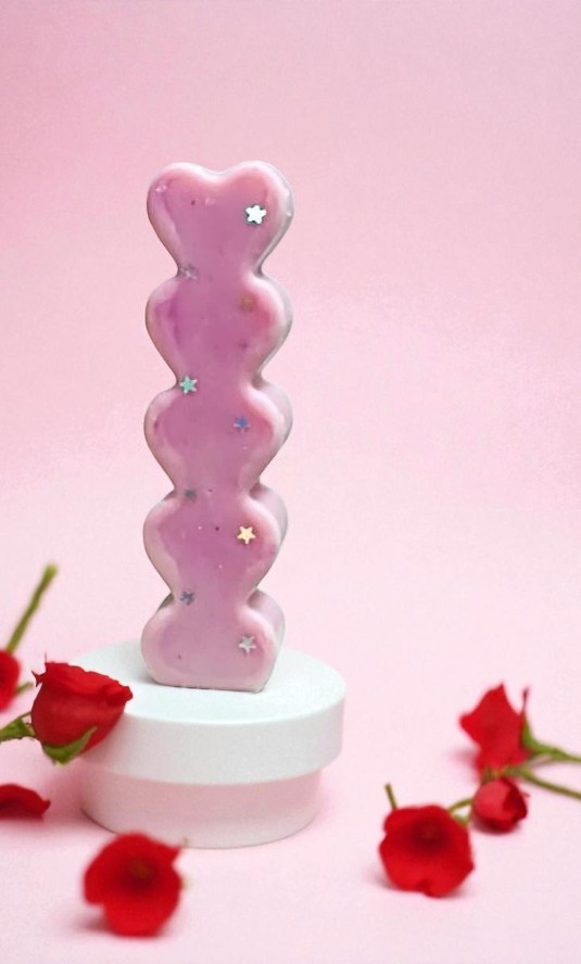 VELA CORAZON ALARGADA